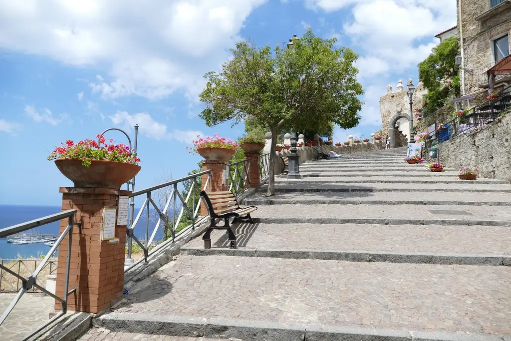 The stairway leading up to the gate of Agropoli's old town, with the sea in the background