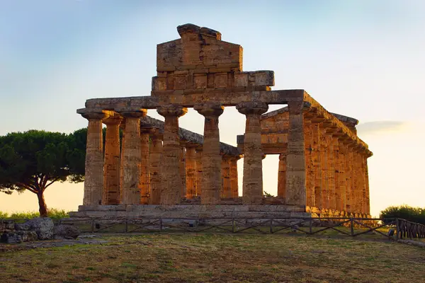 A Doric temple in Paestum at sunset